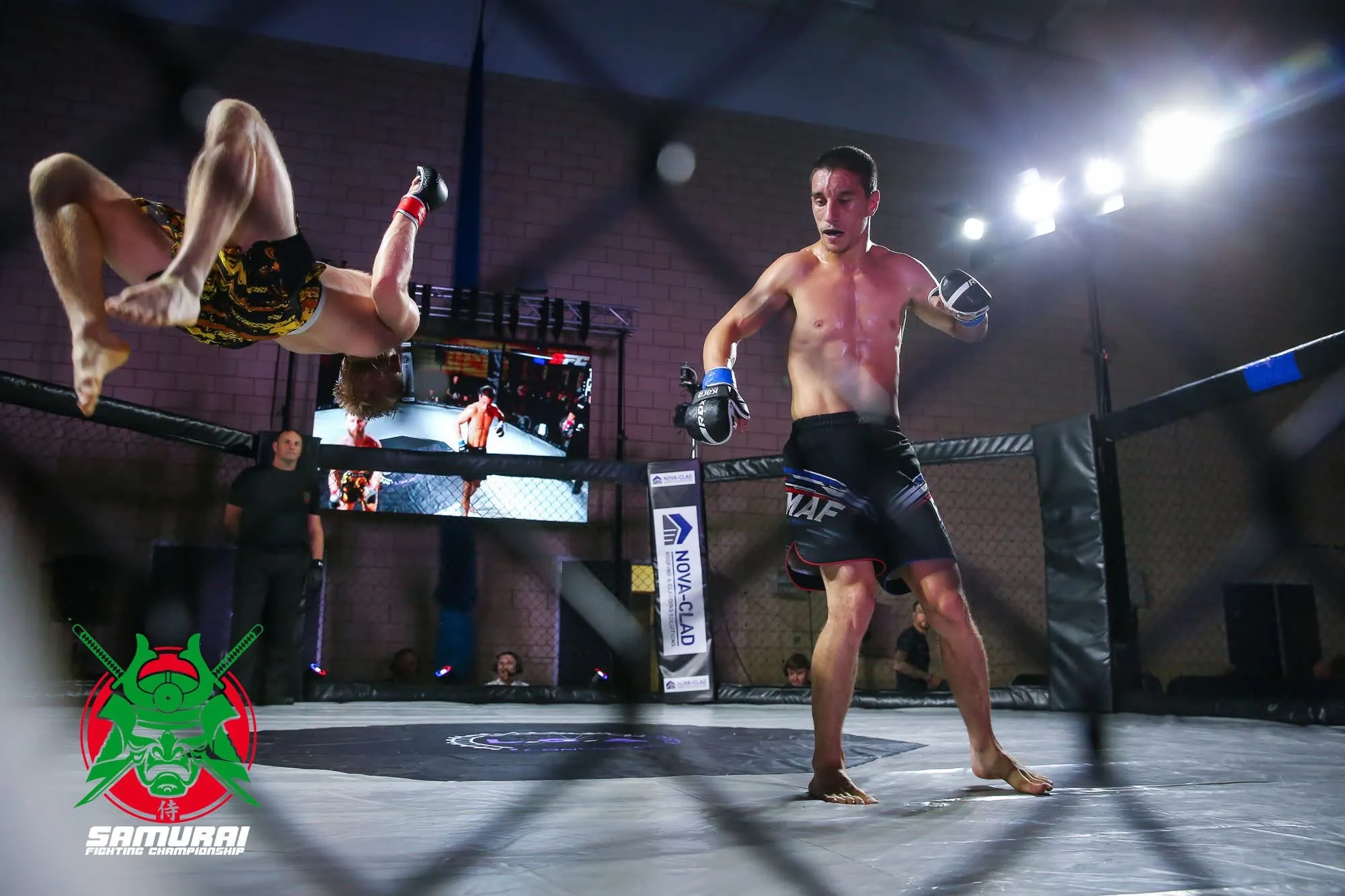 Matthew Waters throwing a flying knee in the cage