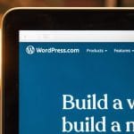 picture of laptop with wordpress website on it
